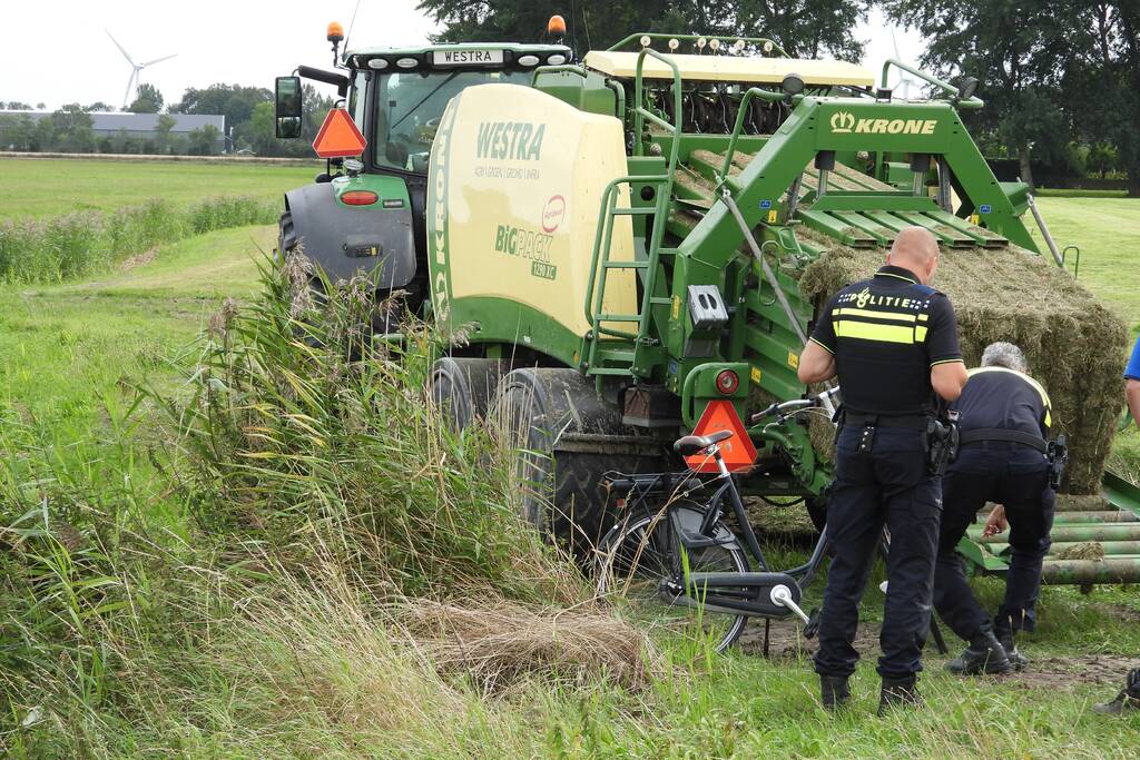 E-biker komt in botsing met grootpakpers
