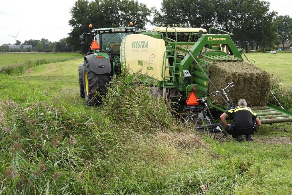 E-biker komt in botsing met grootpakpers