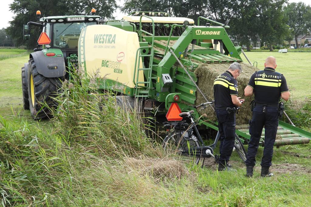 E-biker komt in botsing met grootpakpers