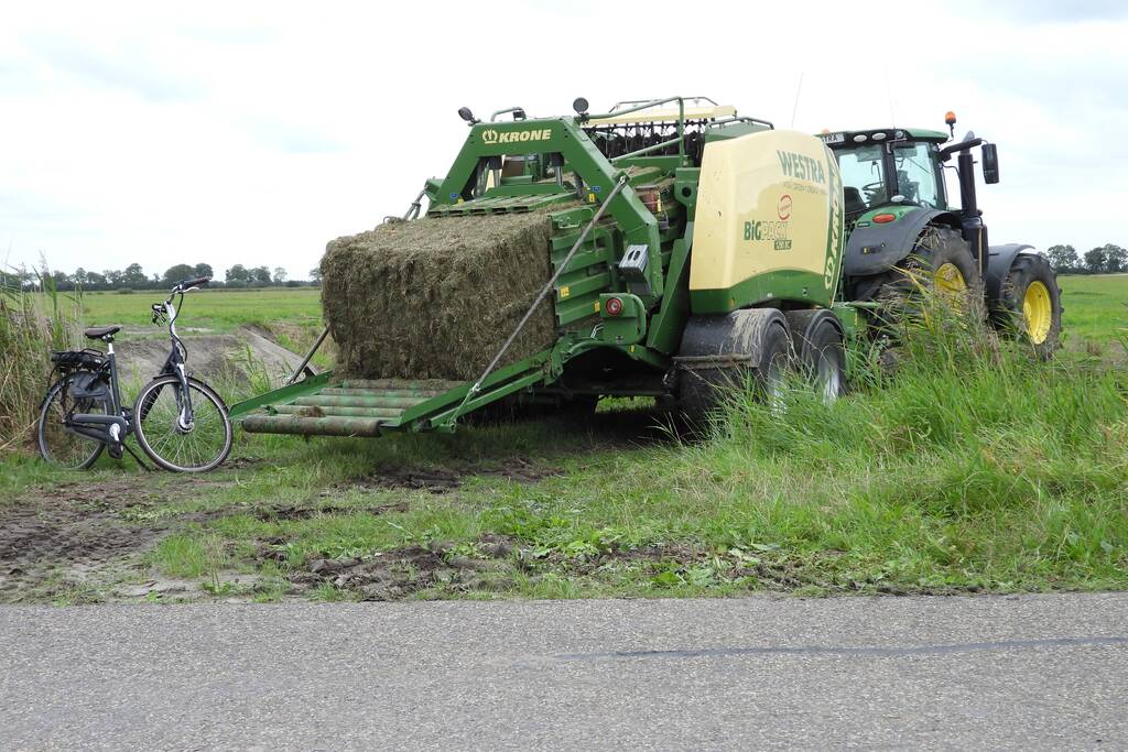 E-biker komt in botsing met grootpakpers