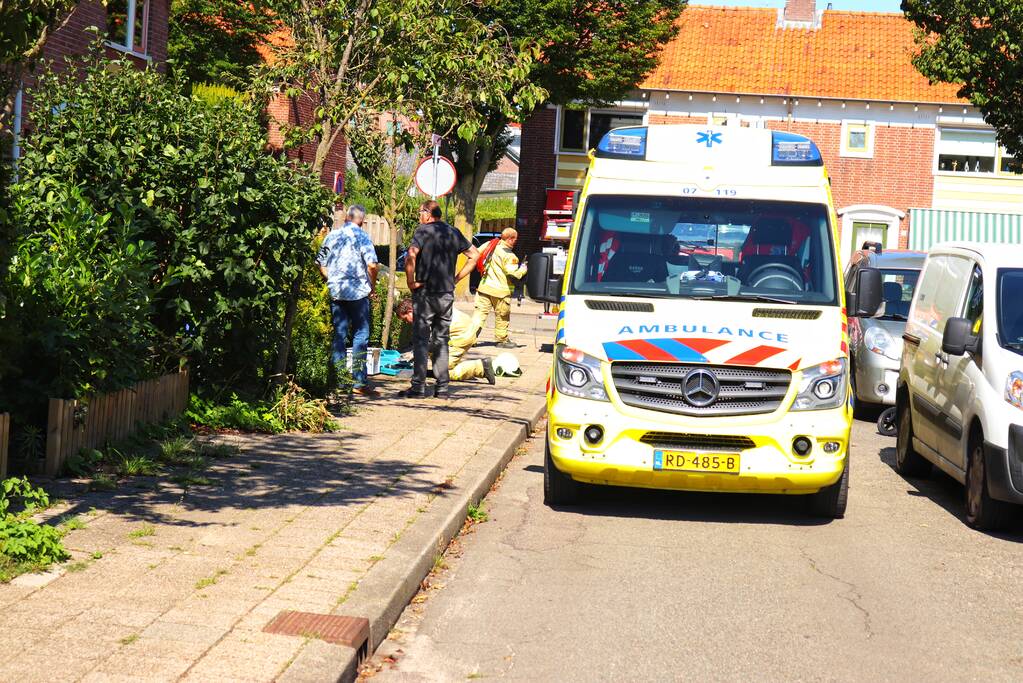 Hark doorboord voet van man en zit muurvast