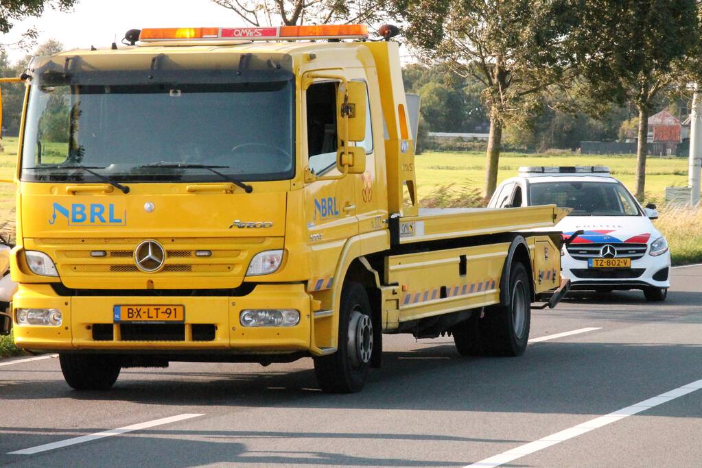 Forse schade na aanrijding met drie auto's