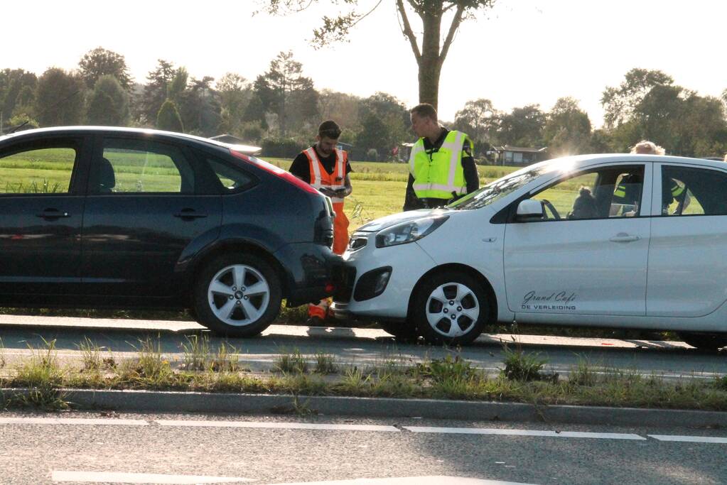 Forse schade na aanrijding met drie auto's