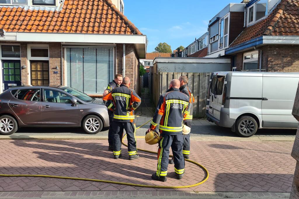 Brand in achtertuin van woning