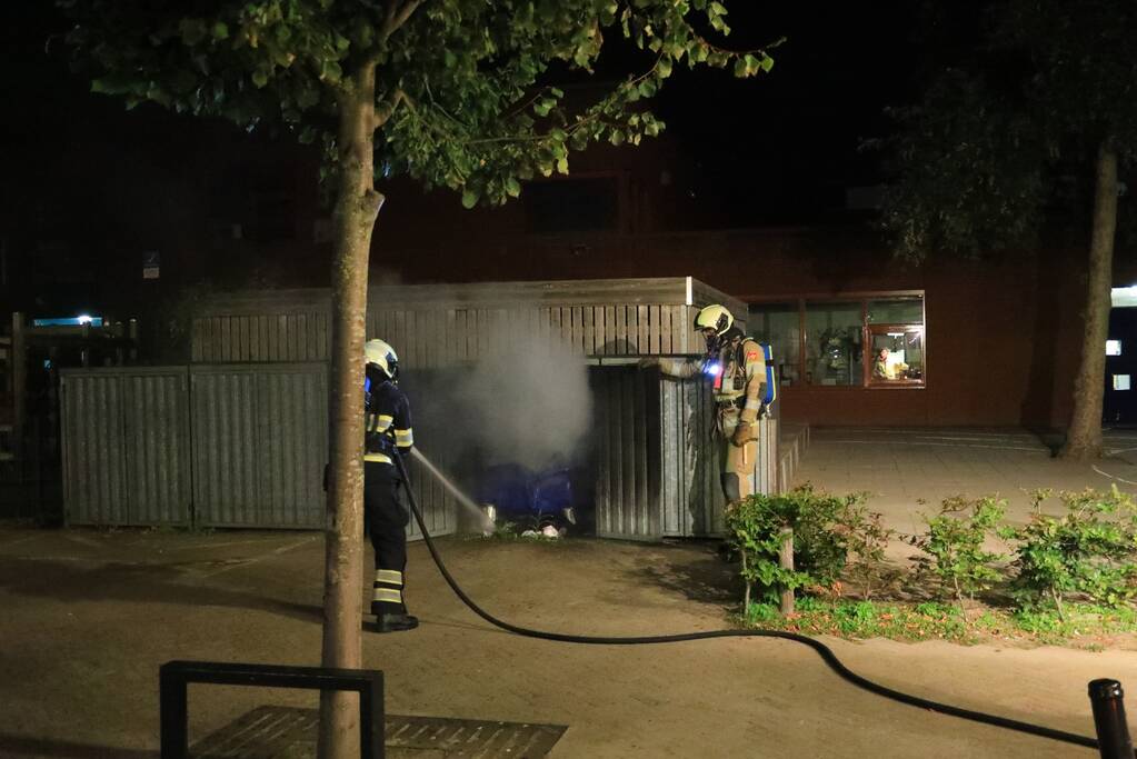 Papiercontainer verwoest door brand