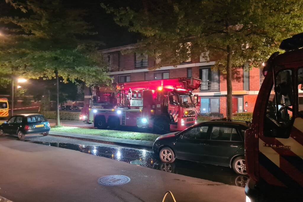 Personen en hond met klachten bij brand