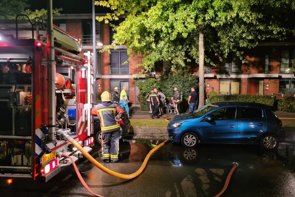 Personen en hond met klachten bij brand
