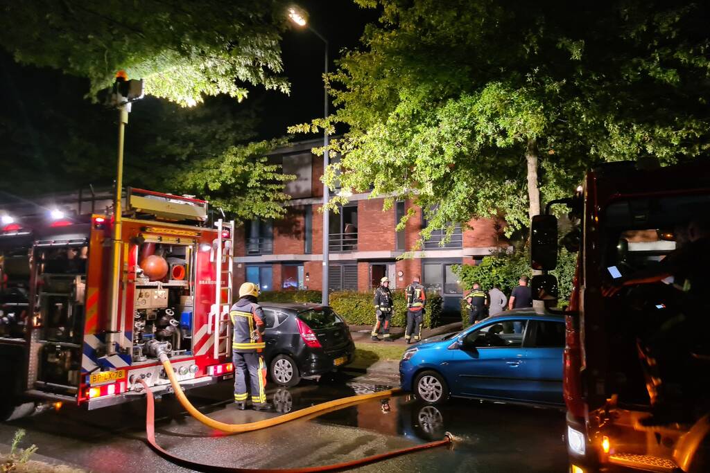 Personen en hond met klachten bij brand