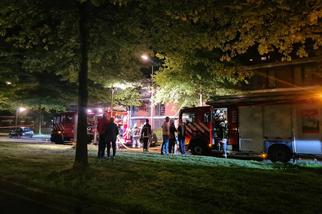 Personen en hond met klachten bij brand