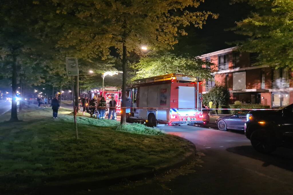 Personen en hond met klachten bij brand
