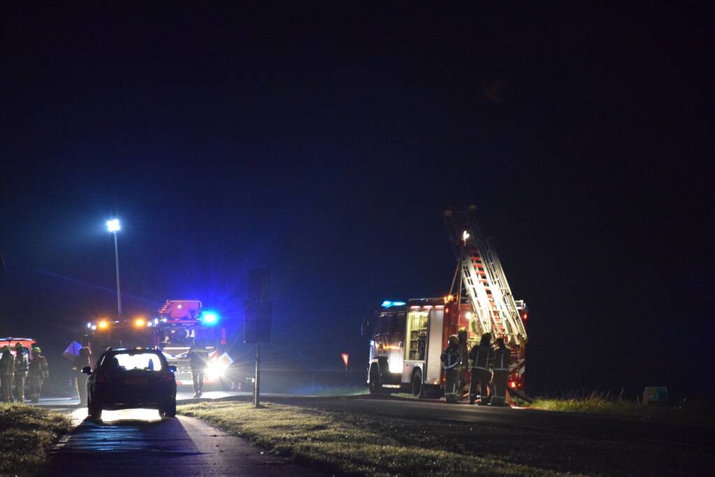 Grote uitslaande brand in loods