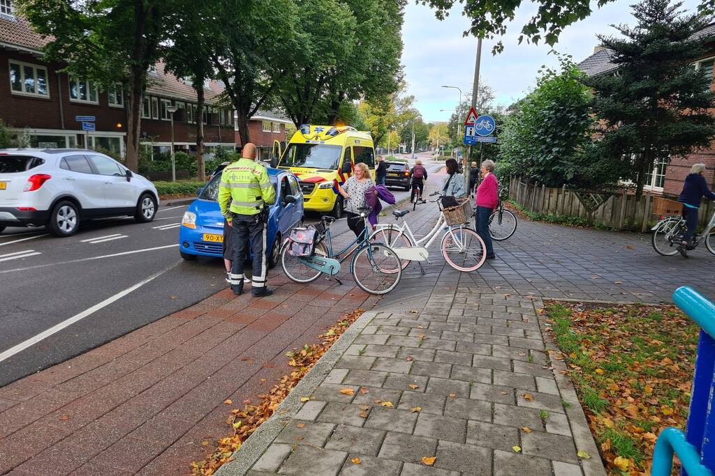 Twee fietsers botsen op elkaar