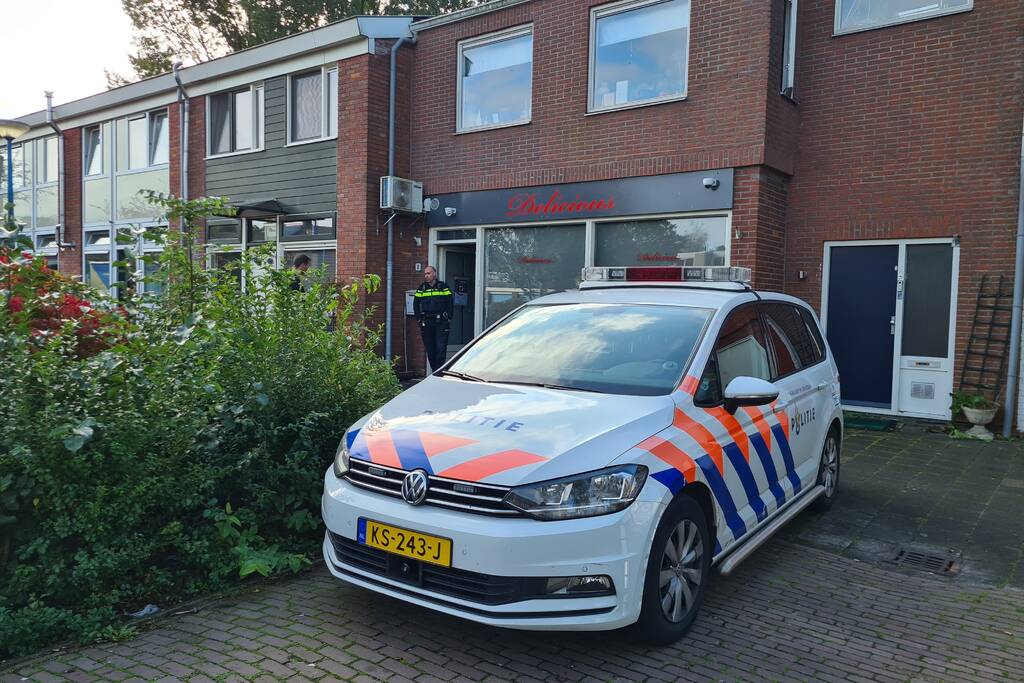 Politie en specialisten doen onderzoek bij Delicious