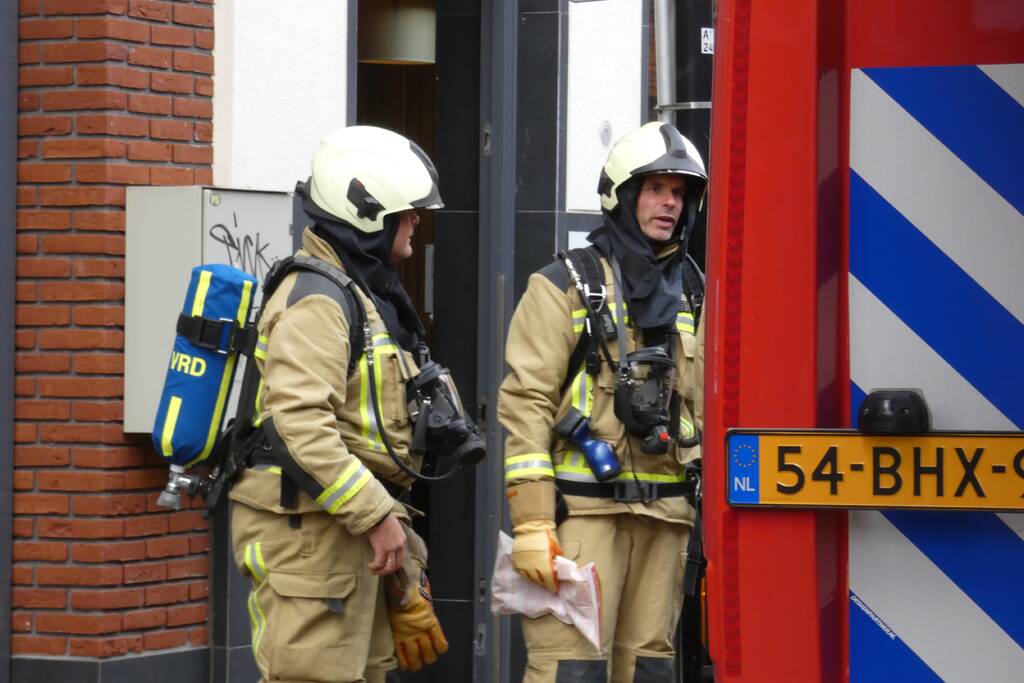 Brandweer blust brand in gebouw ICare