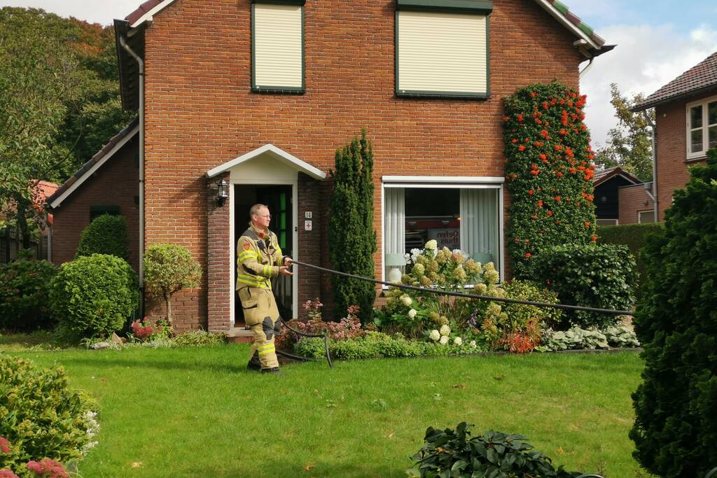 Te warme kachel veroorzaakt brand in woning