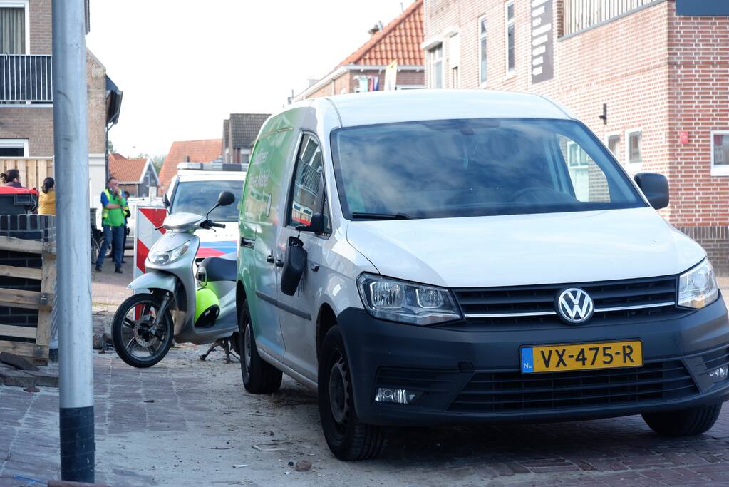 Fietsster gewond na botsing met personenauto
