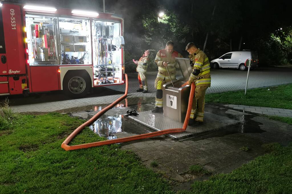Flinke brand in ondergrondse container