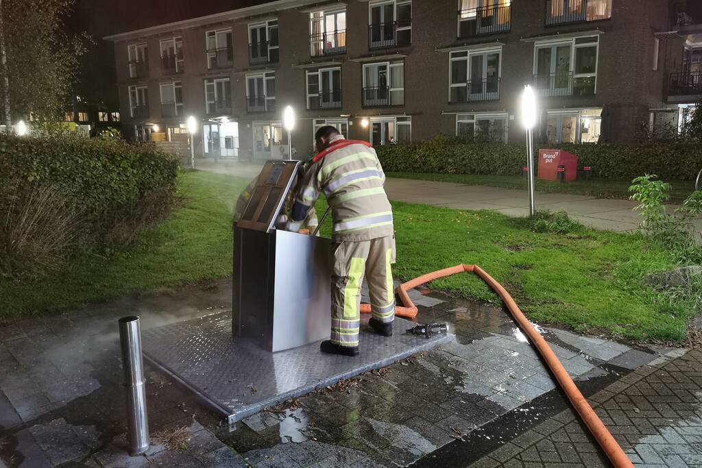 Flinke brand in ondergrondse container