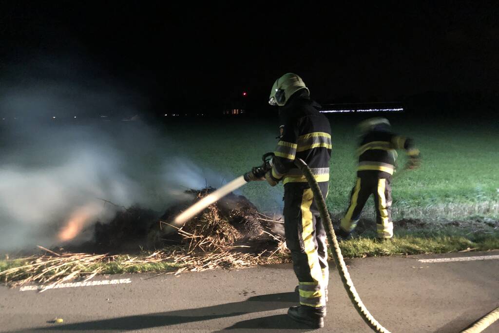 Bult gras in brand gevlogen