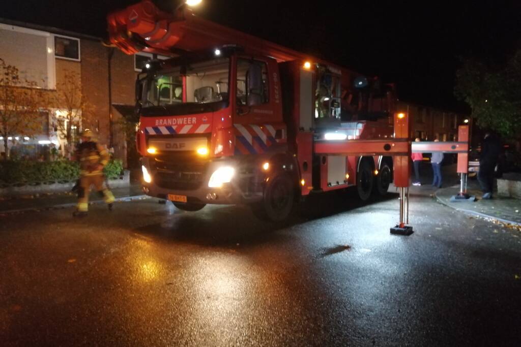 Brandweer blust schoorsteenbrand