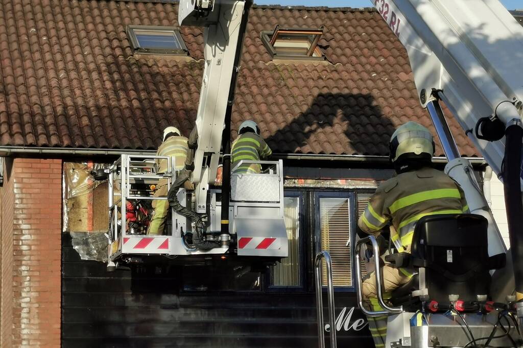 Brand in gevel van tussenwoning