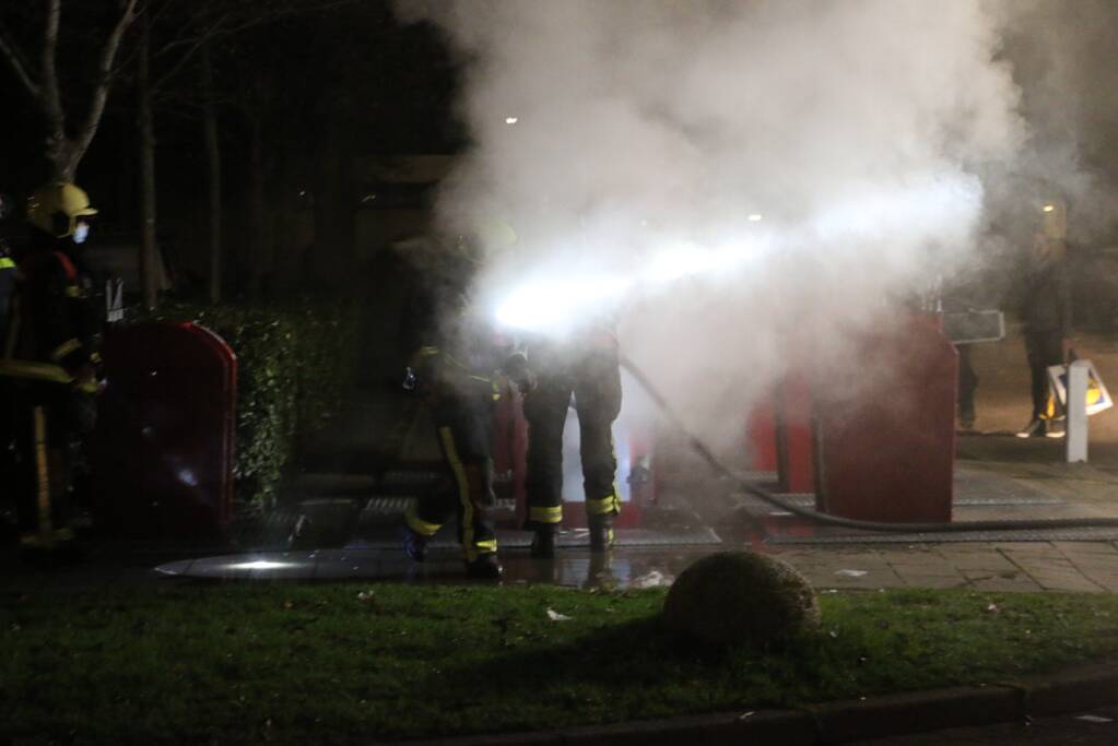 Ondergrondse container in brand