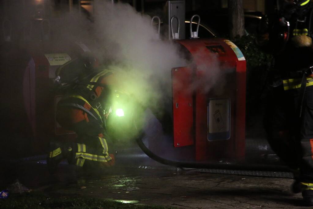 Ondergrondse container in brand