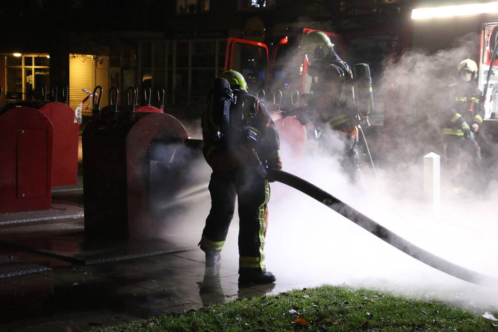 Ondergrondse container in brand