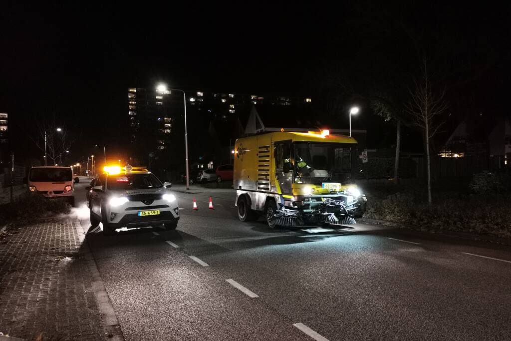Weg afgesloten door glas op wegdek