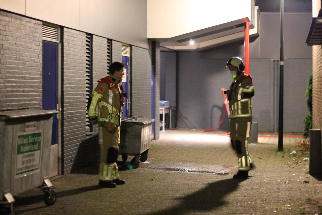 Brandende container snel geblust