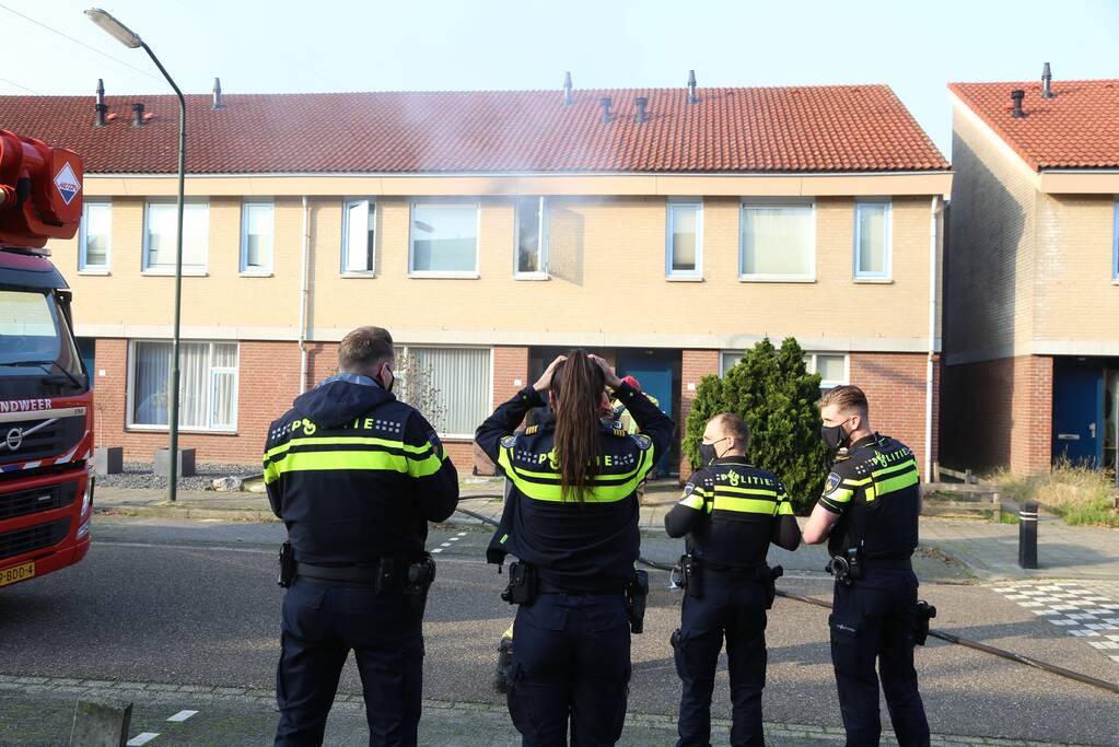 Brand in badkamer van woning