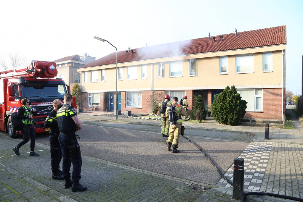 Brand in badkamer van woning