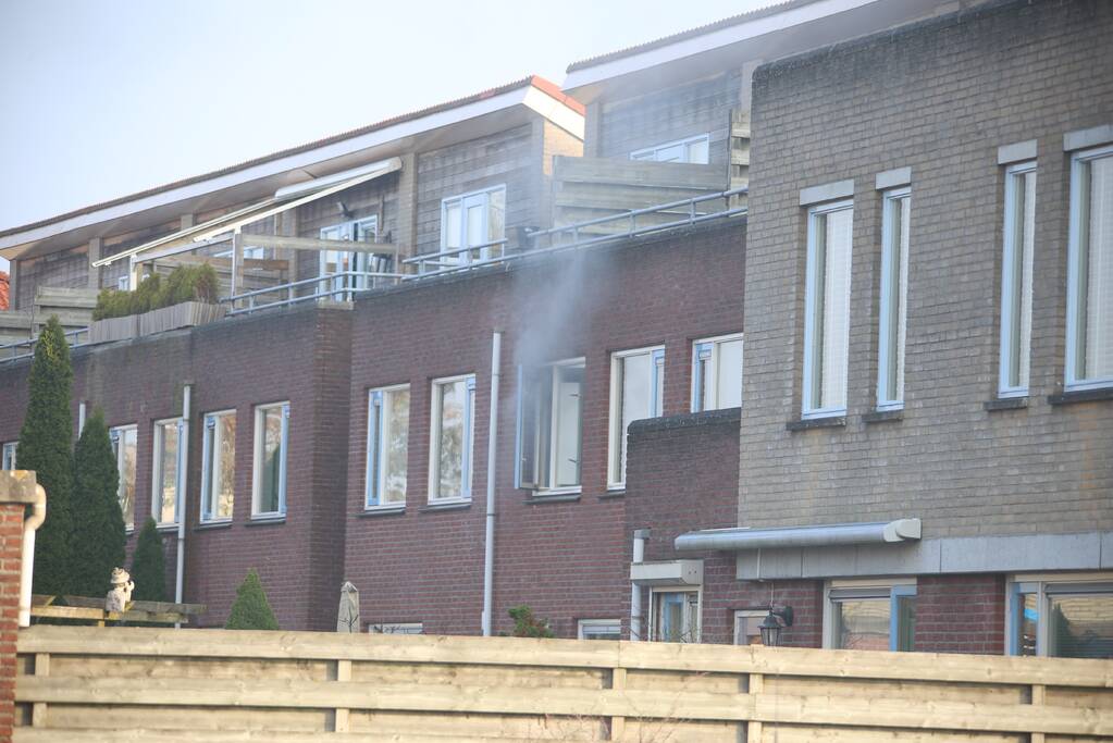 Brand in badkamer van woning