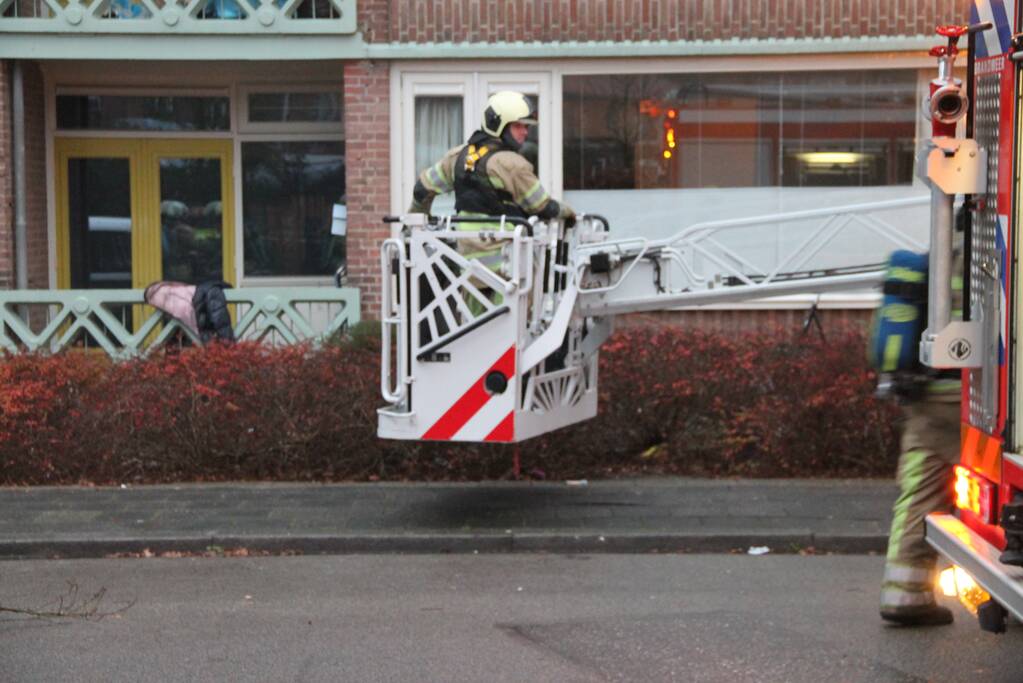 Brand in een trappenhuis van flatgebouw