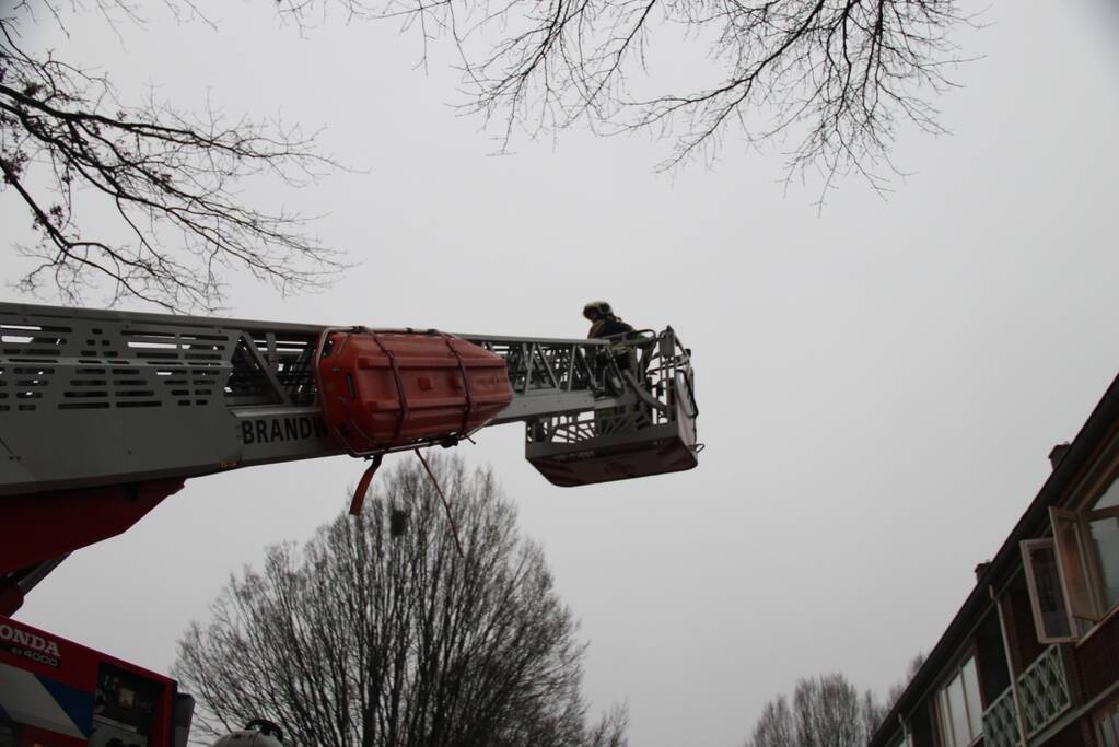 Brand in een trappenhuis van flatgebouw