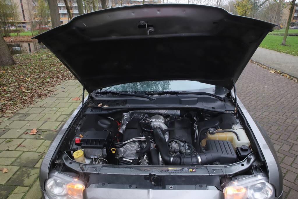 Brand na bijvullen olietank auto