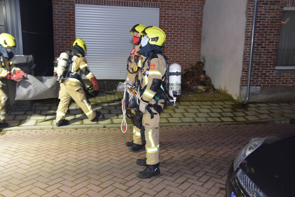 Schoorsteen geveegd na brand