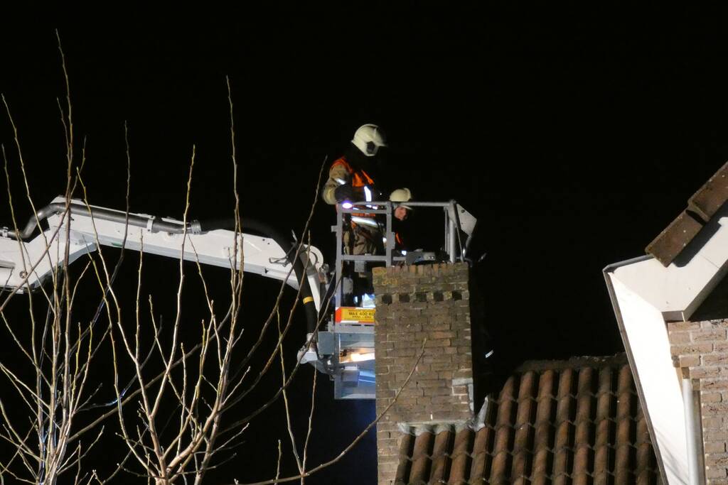 Schoorsteen geveegd na brand