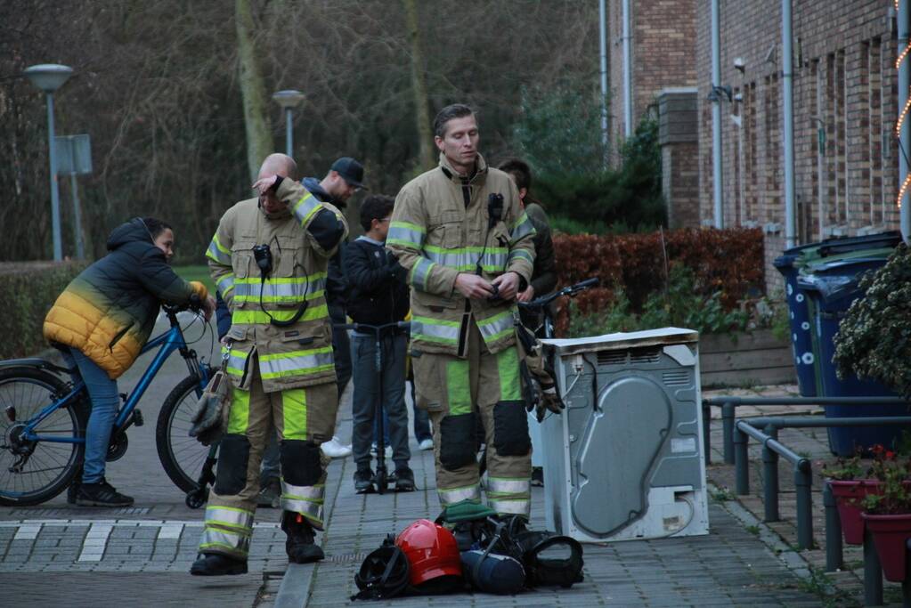 Wasdroger in brand in woning