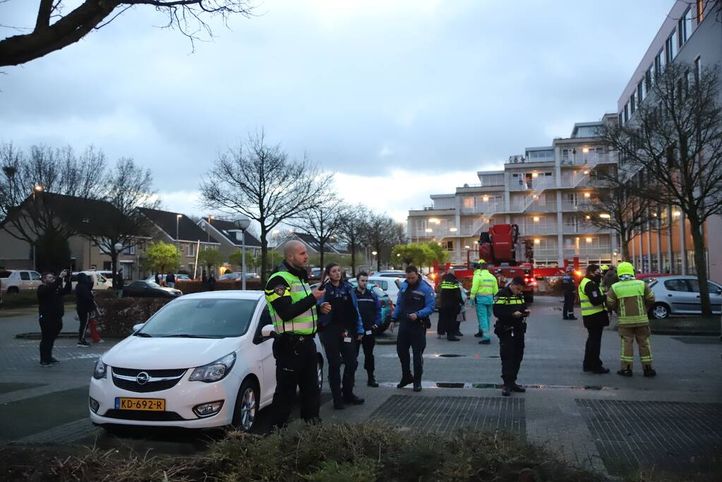 Appartementencomplex vol rook door brand
