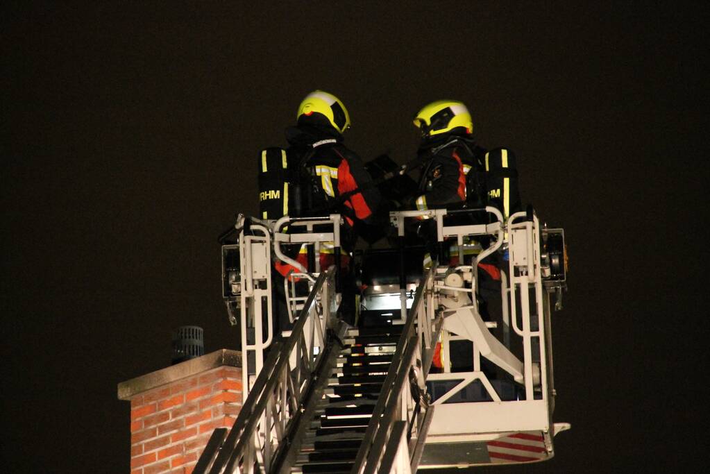 Uitslaande brand in schoorsteen