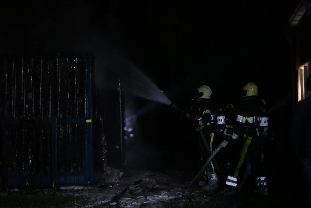 Brand in grote container