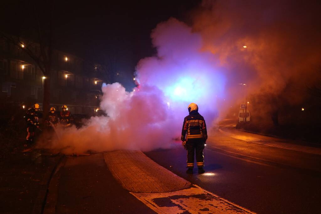 Stapel hout in brand gestoken