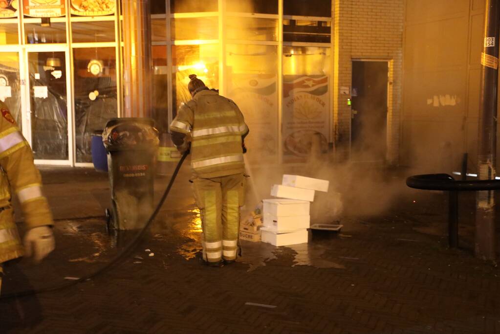 Brand in stapel karton