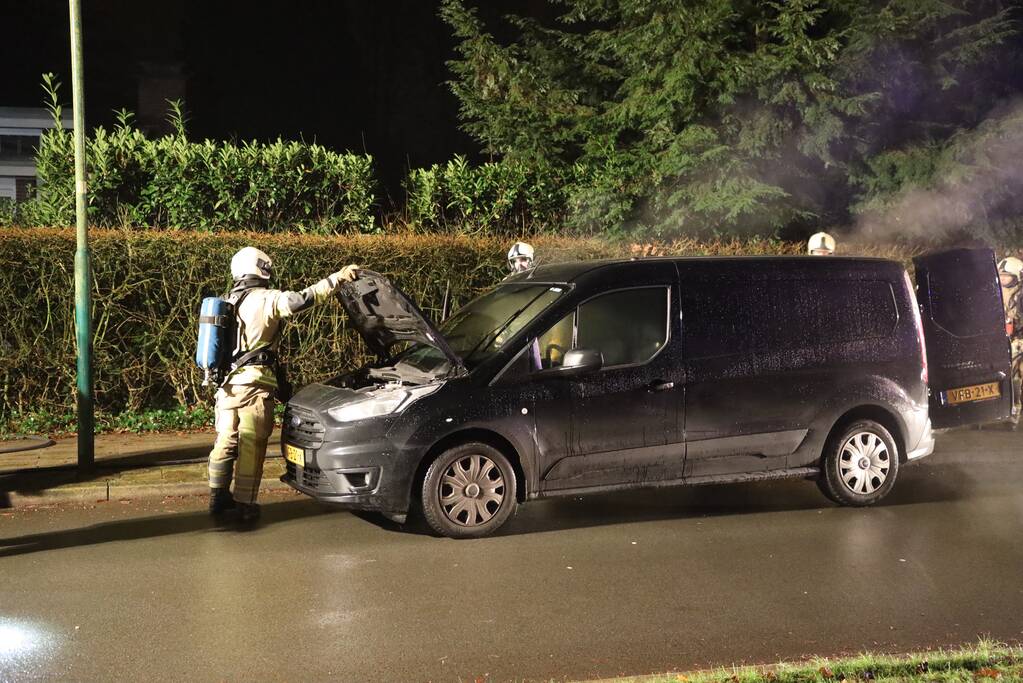 Forse schade na brand in bestelbus
