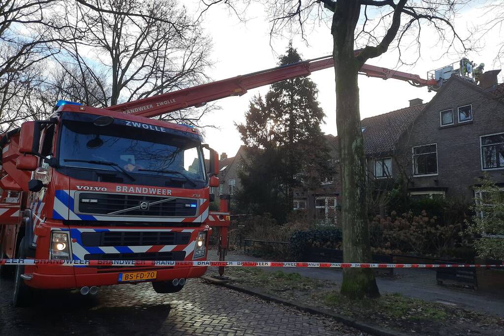 Schoorsteenbrand geveegd na brand