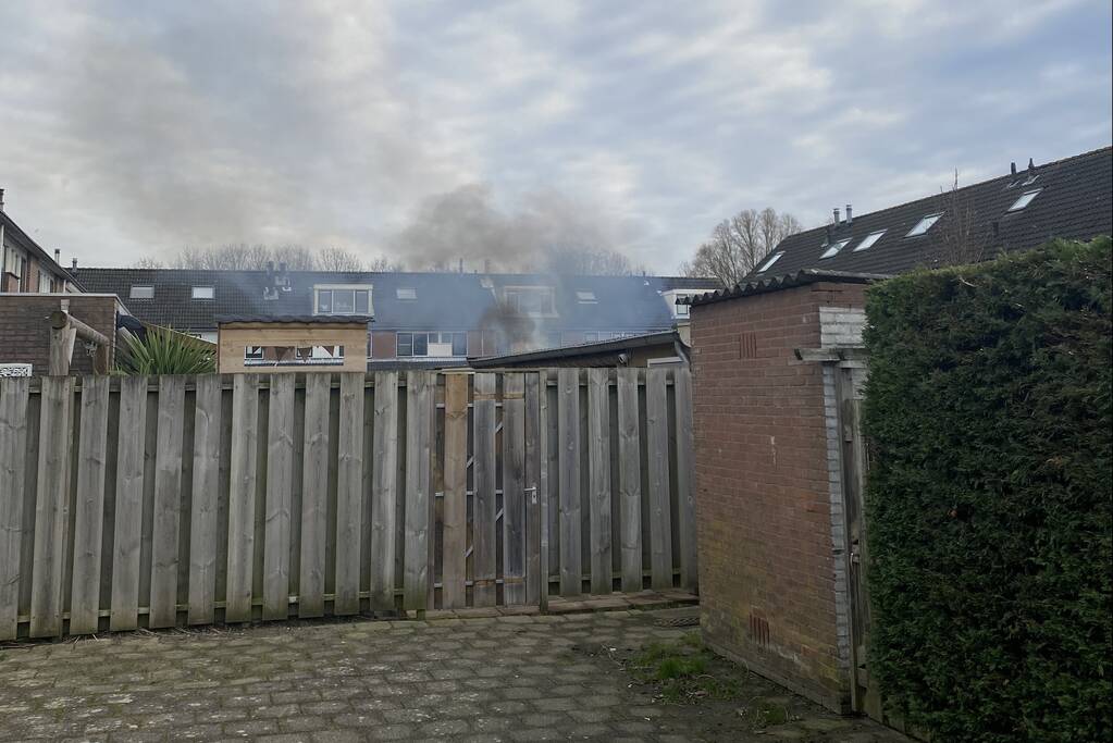 Schutting flink beschadigd door brand