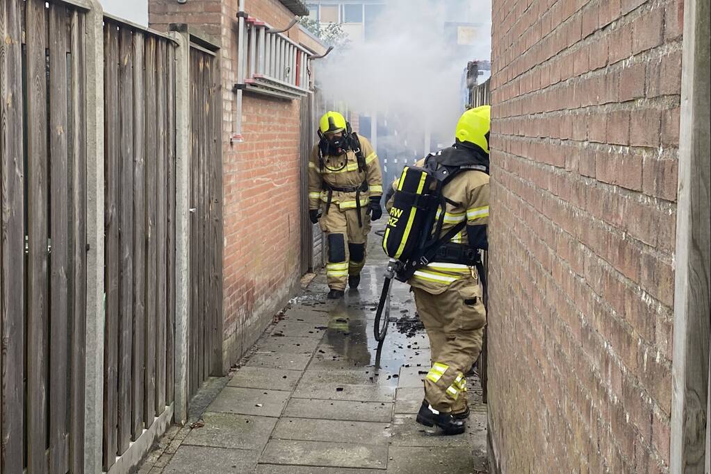 Schutting flink beschadigd door brand