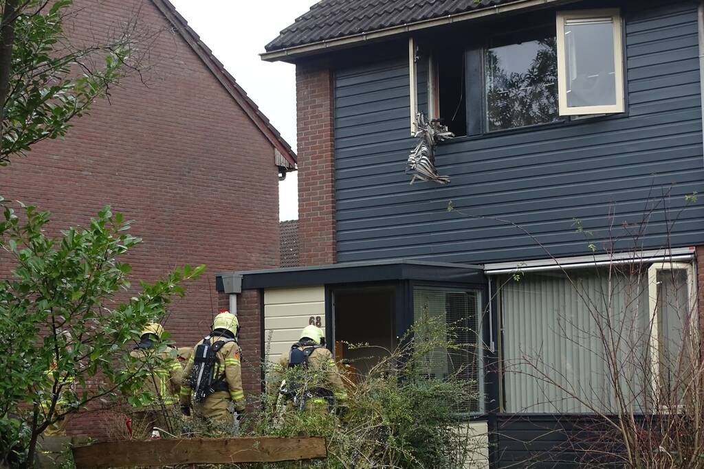 Witgoed-apparaat vat vlam