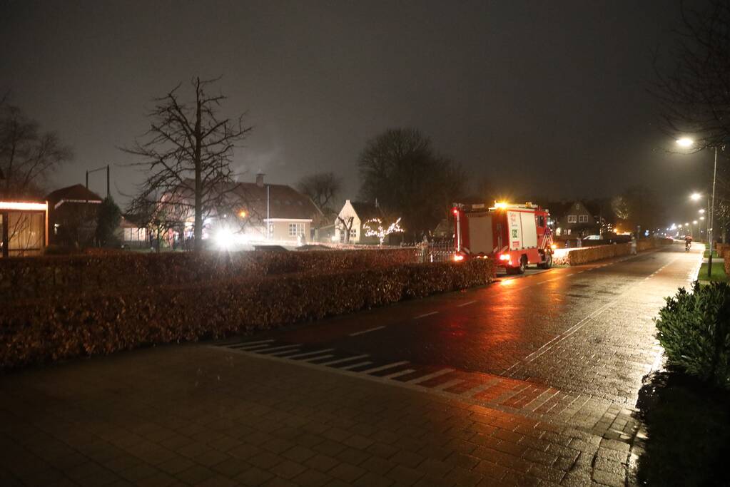 Veel rook door schoorsteenbrand